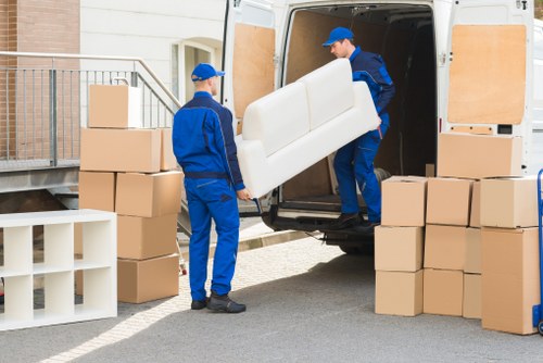 Storage facility staff following safety procedures at Wimbledon Storage