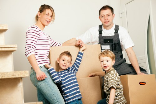 Packed boxes and furniture prepared for Wimbledon flat removals