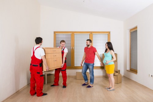 Office furniture and boxes prepared for relocation in Wimbledon