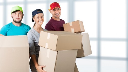 Furniture and boxes being loaded for house removals in Wimbledon