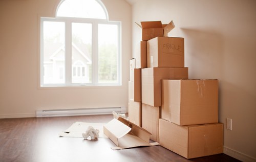 Packed moving boxes and furniture for Wimbledon house removals